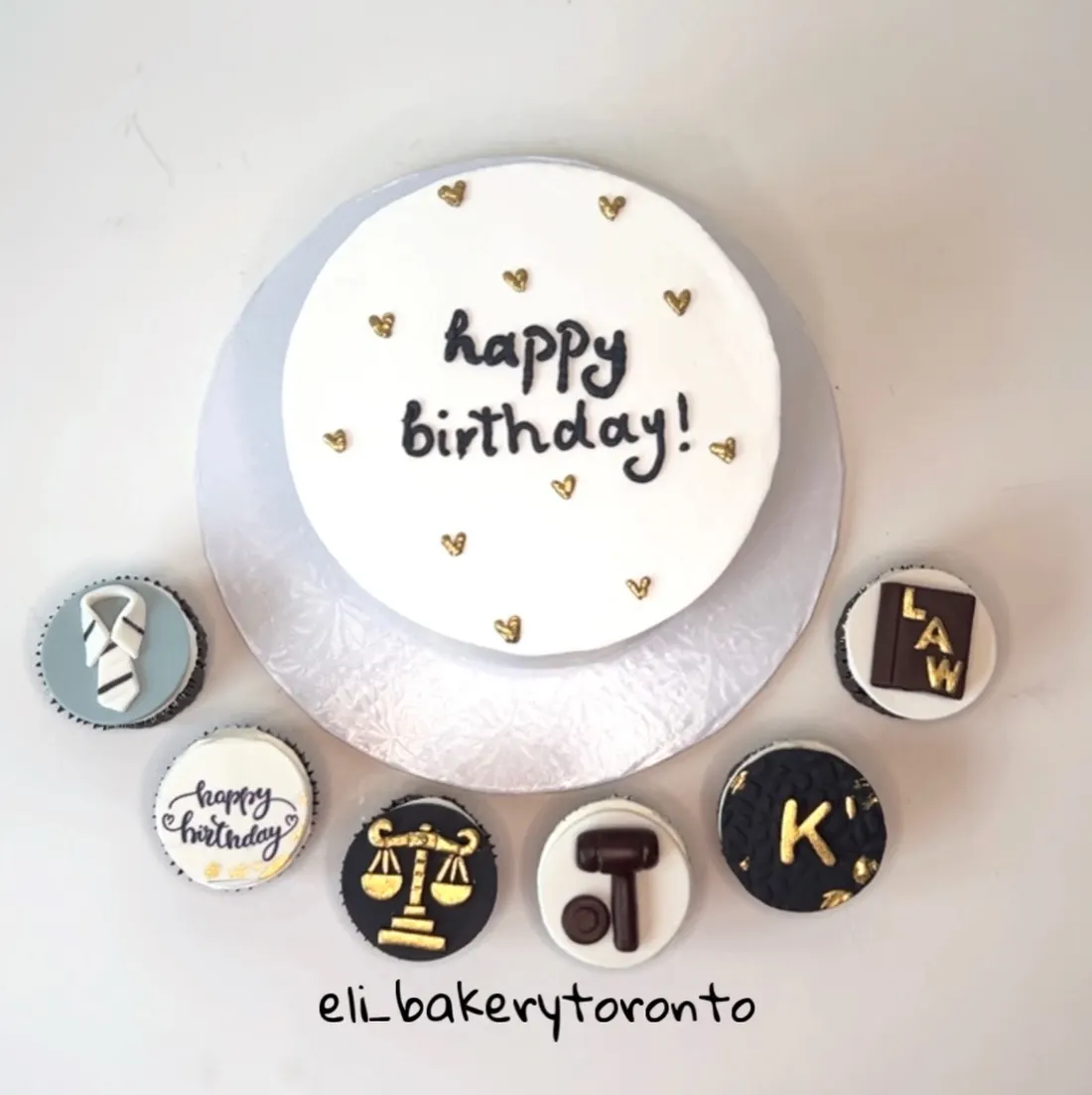 Birthday cake with matching law-themed cupcakes — scales of justice, gavel and law book